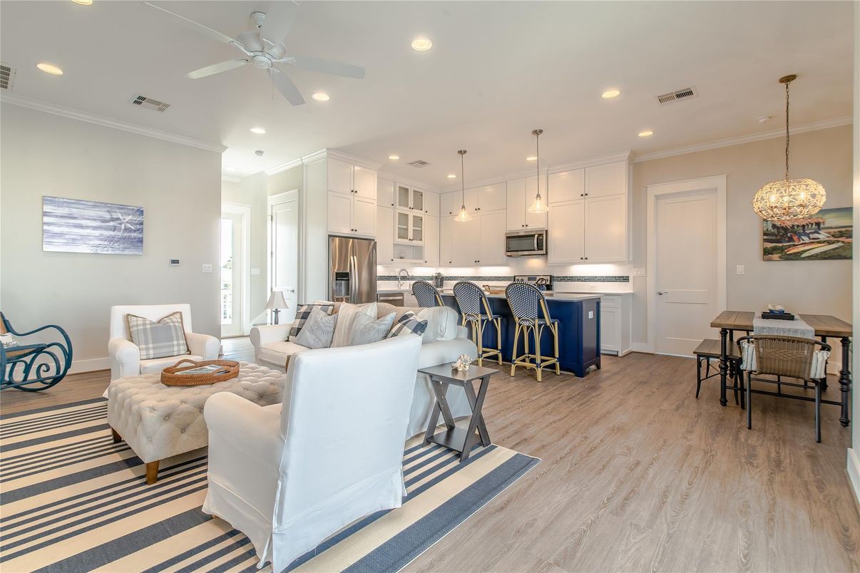 Dining room, Interior, Kitchen, Living room, Pendant Lights, Recessed Lighting, Stainless Steel Appliances, Wood Texture Flooring
