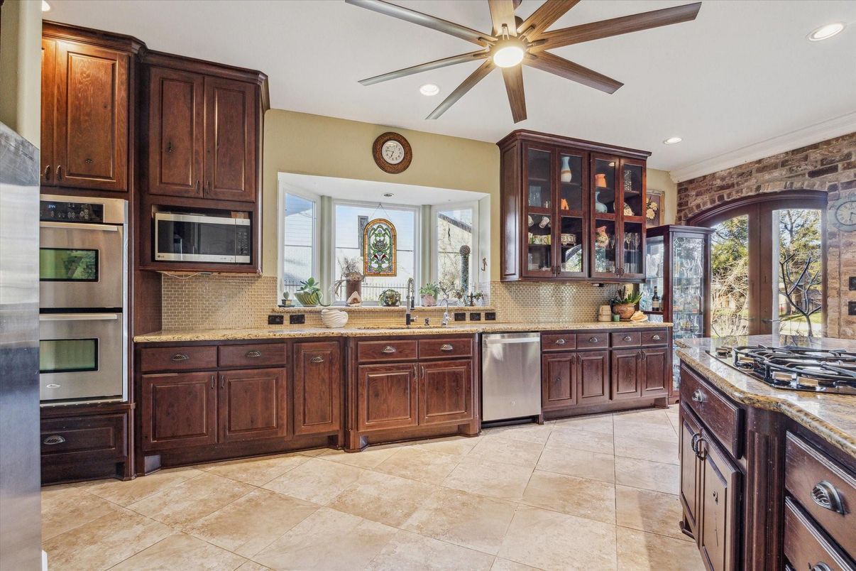 Interior, Kitchen, Recessed Lighting, Stainless Steel Appliances, Stone Walls