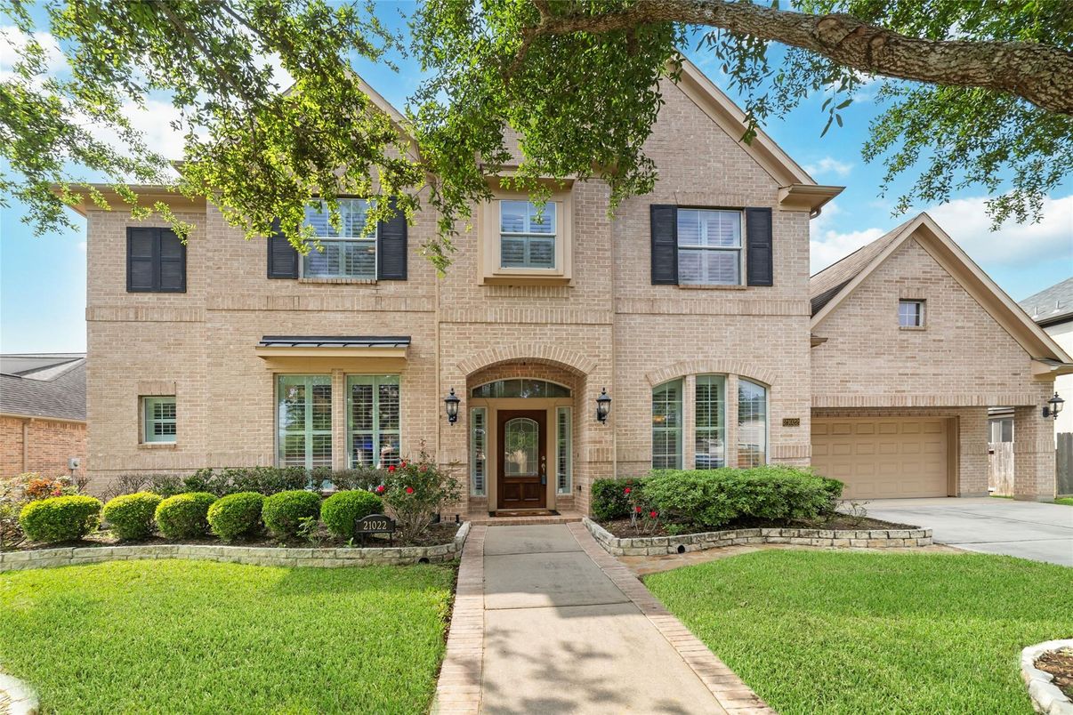 Attached, Exterior, Facade, Brick Facade, Brick Traditional