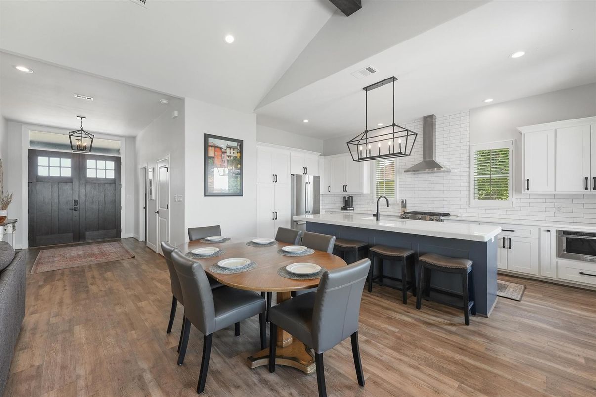 Dining room, Interior, Kitchen, Pendant Lights, Recessed Lighting, Stainless Steel Appliances, Wood Texture Flooring