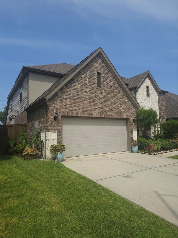 Attached, Exterior, Facade, Brick Facade, Brick Traditional