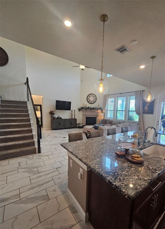 Dining room, Fireplace, Interior, Kitchen, Living room, Marble, Pendant Lights, Recessed Lighting, Water