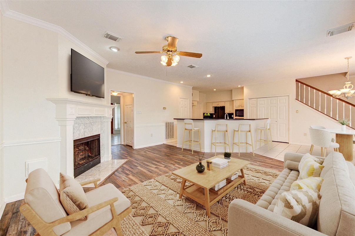 Dining room, Fireplace, Interior, Kitchen, Living room, Recessed Lighting, Wood Texture Flooring
