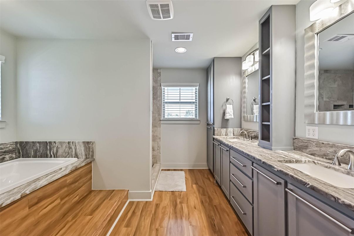 Bathroom, Dual Sink Vanities, Interior, Recessed Lighting, Wood Texture Flooring