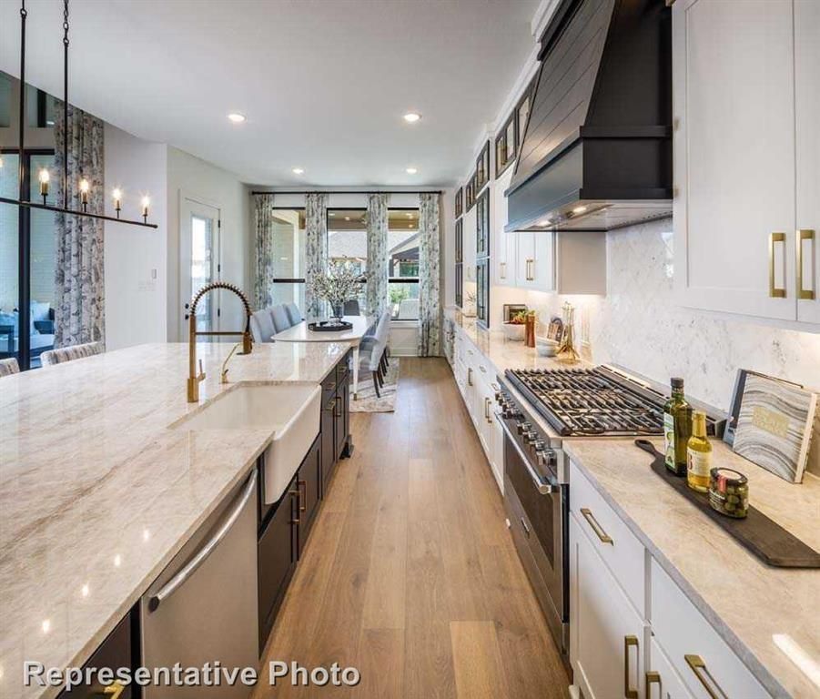 Chandelier, Dining room, Interior, Kitchen, Pendant Lights, Recessed Lighting, Stainless Steel Appliances, Wood Texture Flooring