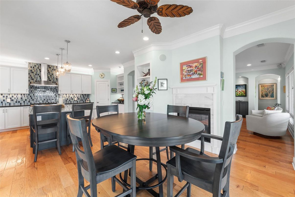 Dining room, Fireplace, Interior, Kitchen, Pendant Lights, Recessed Lighting, Wood Texture Flooring