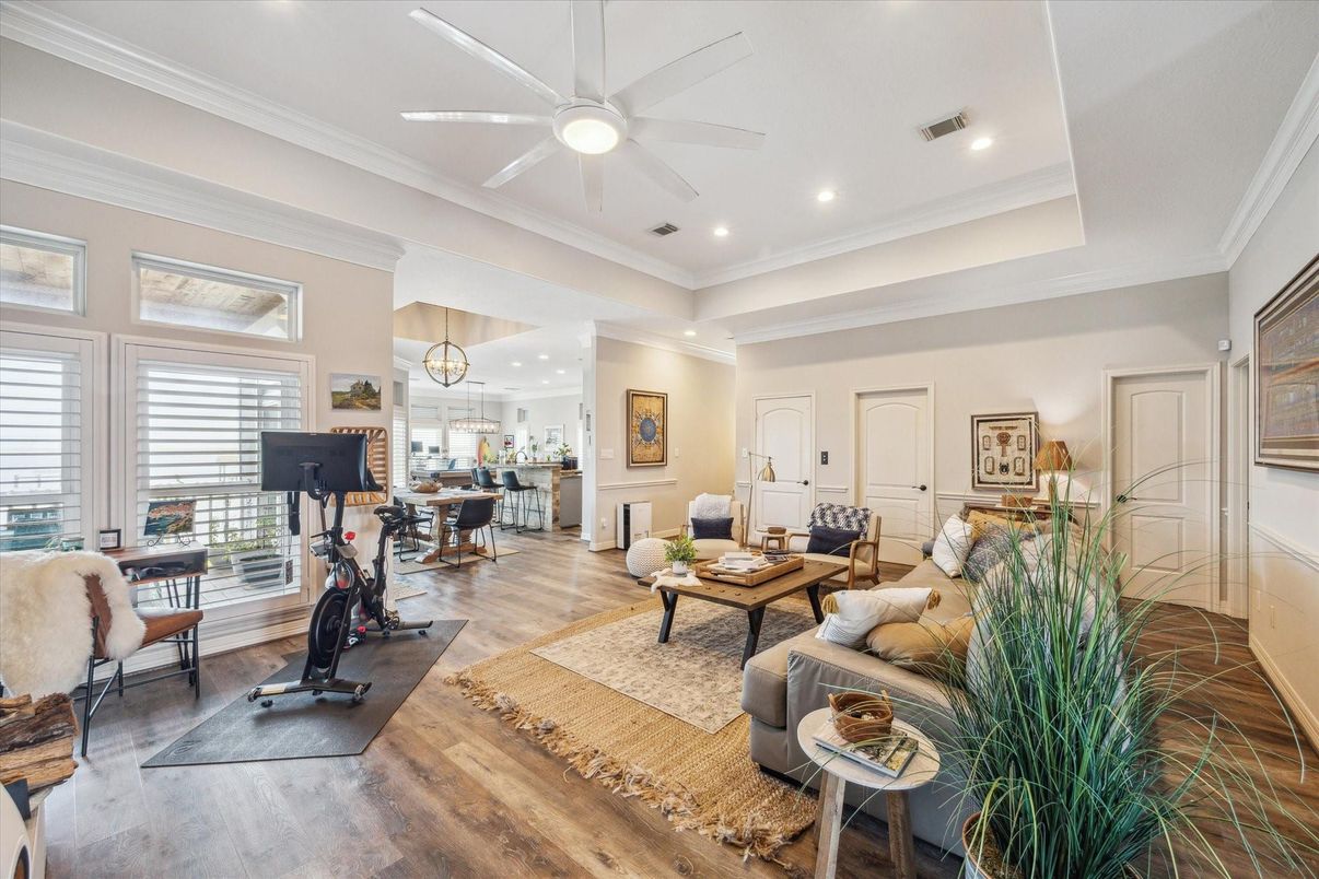 Dining room, Fitness Equipment, Interior, Living room, Pendant Lights, Recessed Lighting, Wood Texture Flooring