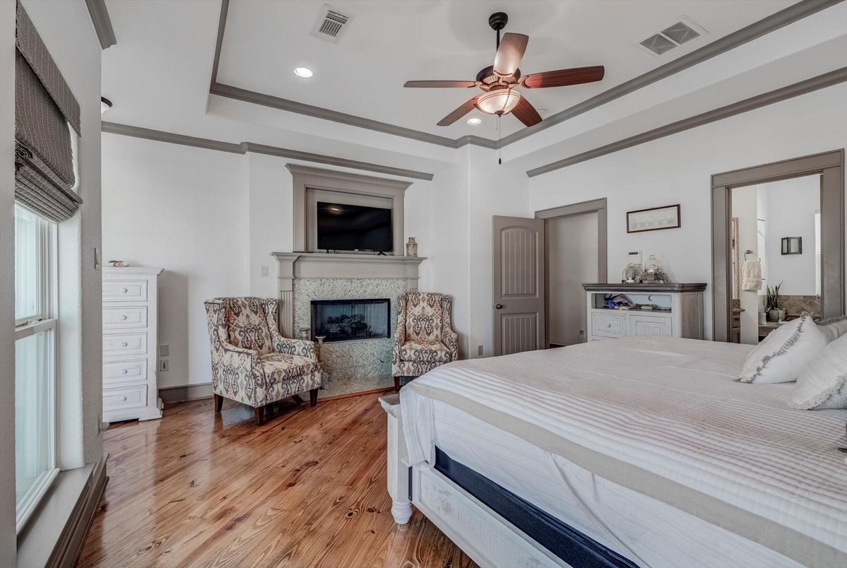 Bedroom, Fireplace, Interior, Recessed Lighting, Wood Texture Flooring