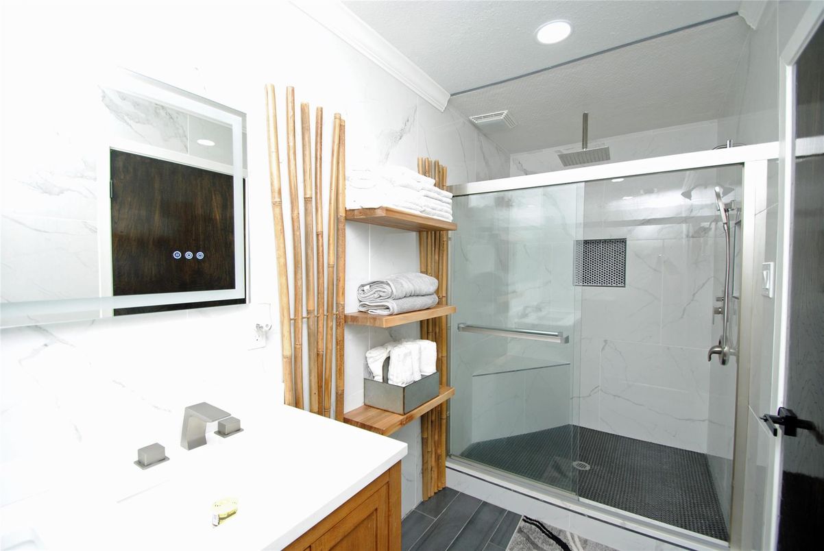 Bathroom, Glass Shower, Interior, Marble Walls, Recessed Lighting, Wood Texture Flooring