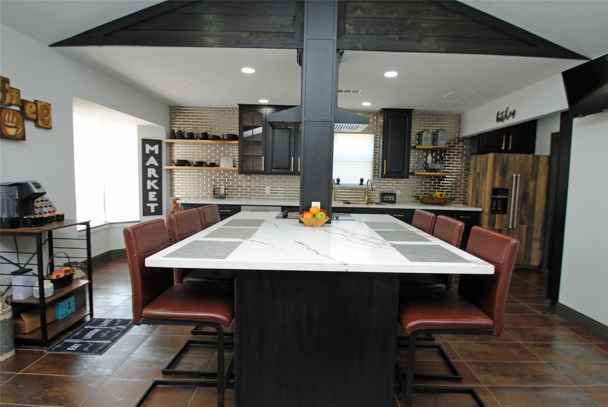 Dining room, Interior, Kitchen, Recessed Lighting, Stainless Steel Appliances, Stone Walls, Wooden Beams