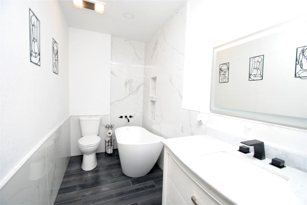 Bathroom, Free Standing Baths, Interior, Marble Walls, Wood Texture Flooring