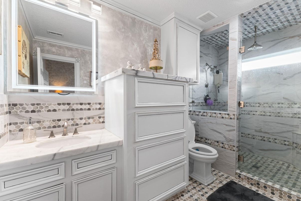 Bathroom, Glass Shower, Interior, Marble Walls, Tile Countertops