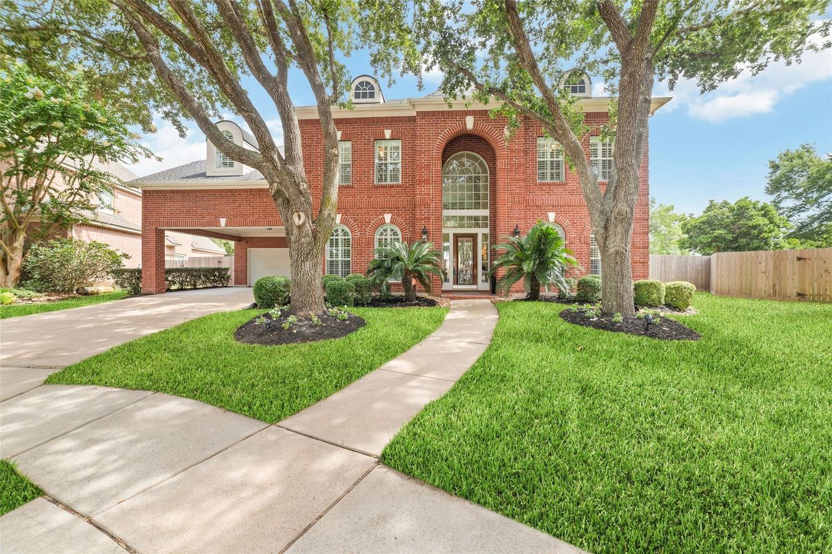 Attached, Backyard, Exterior, Facade, Brick Facade, French Provincial