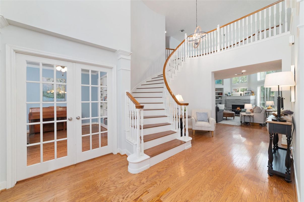 Chandelier, Fireplace, Interior, Living room, Pendant Lights, Recessed Lighting, Wood Texture Flooring