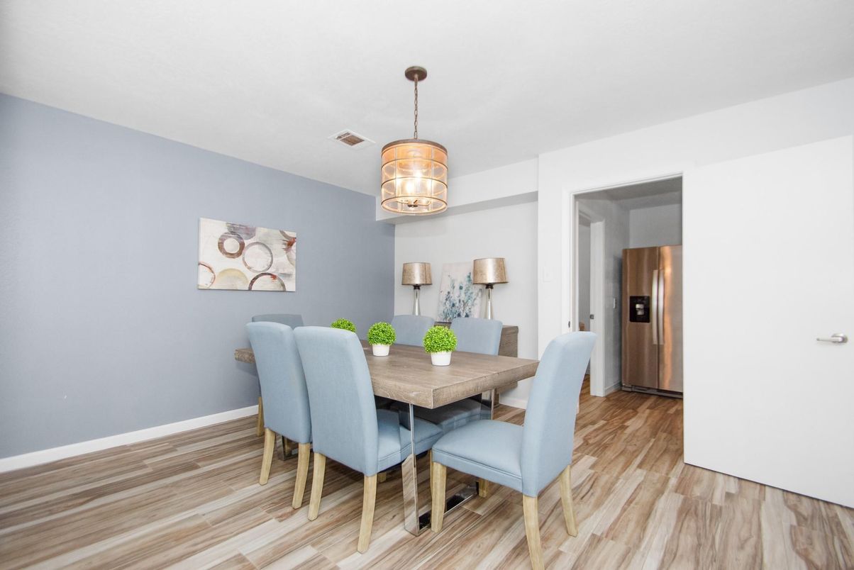 Dining room, Interior, Pendant Lights, Stainless Steel Appliances, Wood Texture Flooring