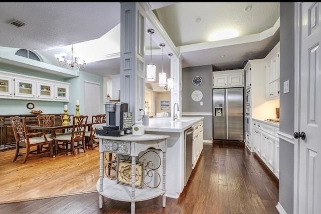 Chandelier, Dining room, Interior, Kitchen, Pendant Lights, Recessed Lighting, Stainless Steel Appliances, Wood Texture Flooring