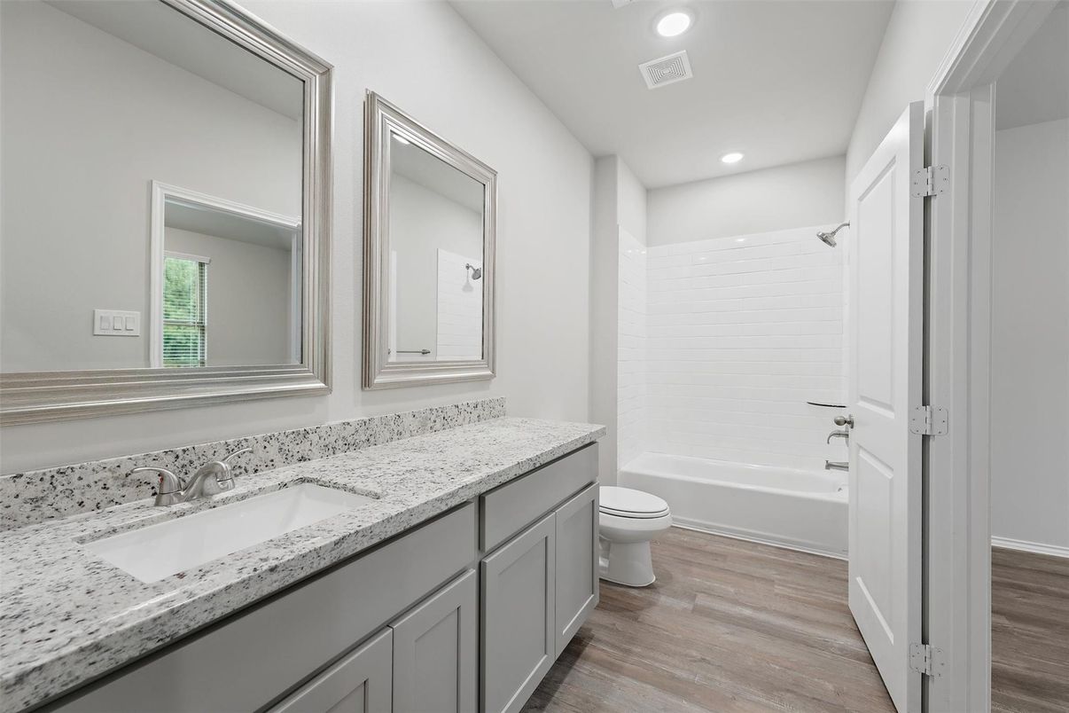 Bathroom, Dual Sink Vanities, Interior, Recessed Lighting, Wood Texture Flooring
