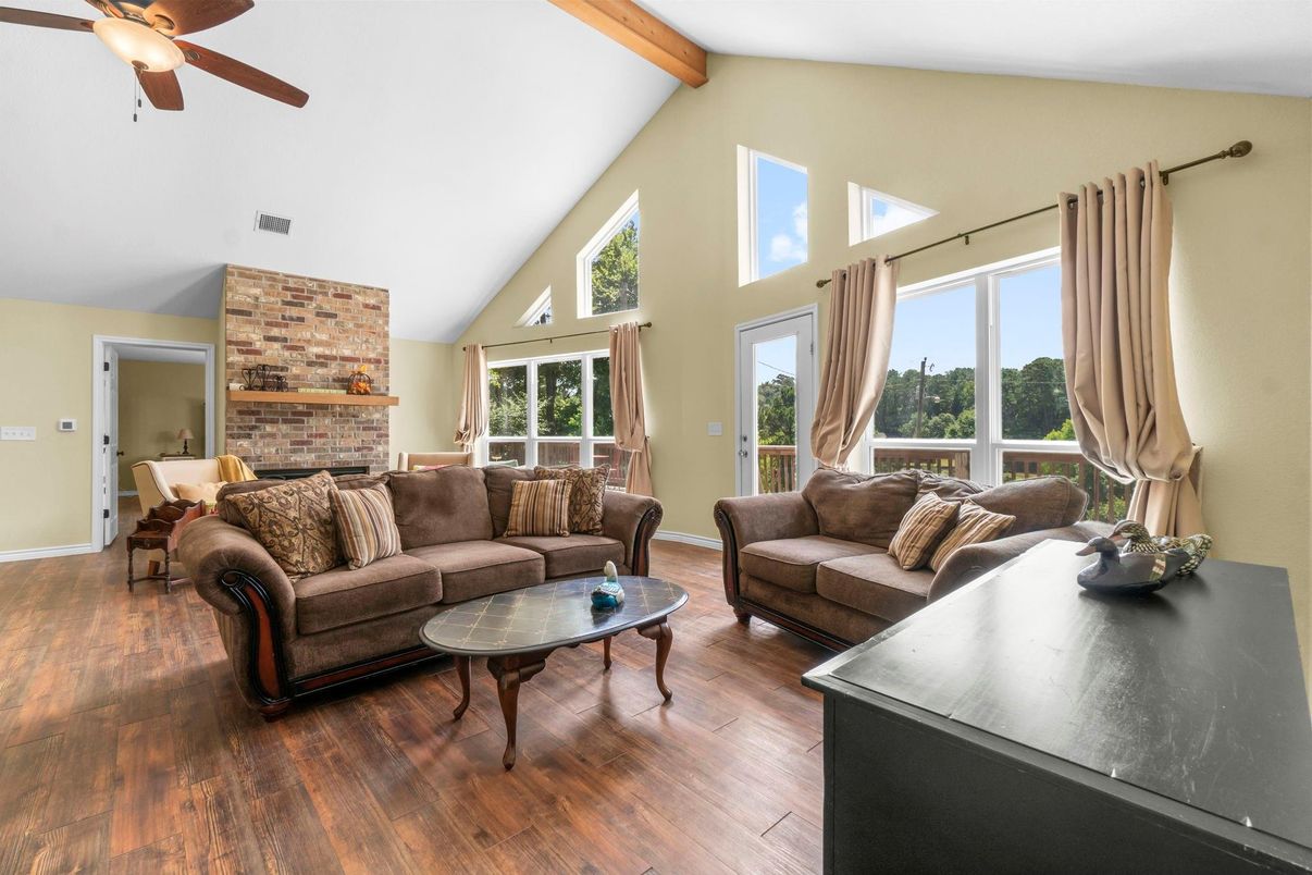 Dining room, Fireplace, Interior, Living room, Stone Walls, Wooden Beams, Wood Texture Flooring