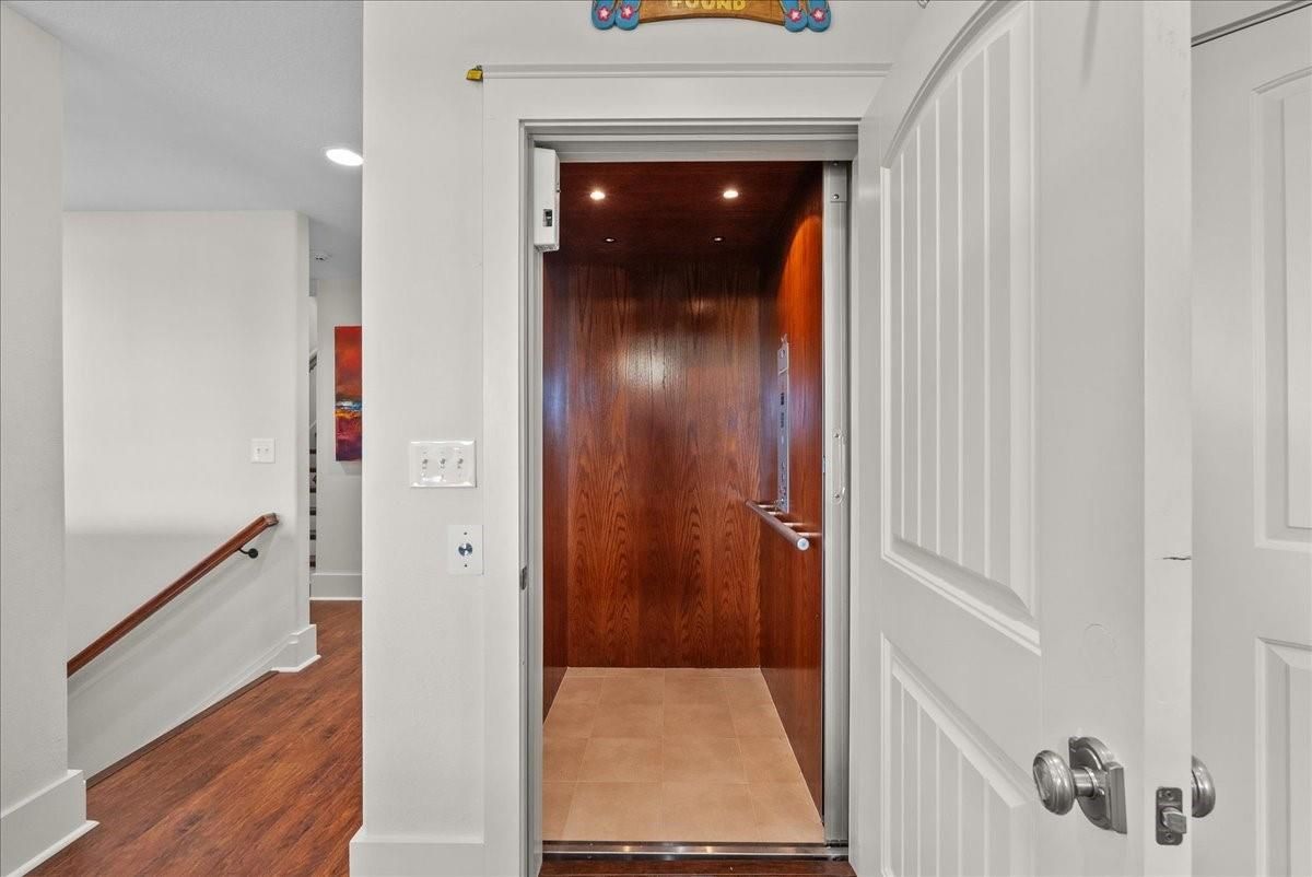 Elevator, Interior, Recessed Lighting, Wooden Ceilings, Wood Texture Flooring, Wooden Walls