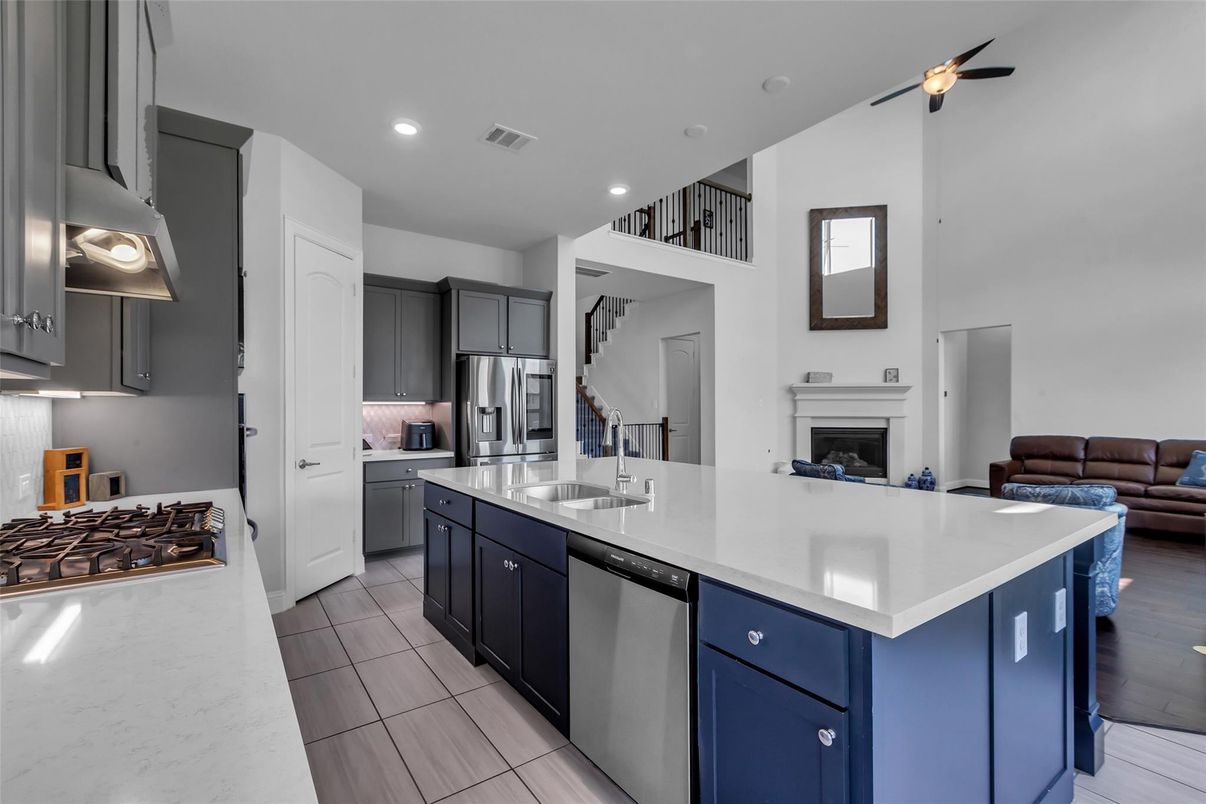 Fireplace, Interior, Kitchen, Living room, Recessed Lighting, Stainless Steel Appliances