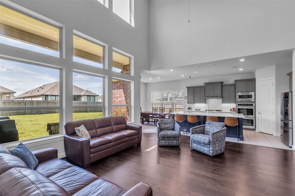 Dining room, Interior, Kitchen, Living room, Recessed Lighting, Stainless Steel Appliances, Wood Texture Flooring
