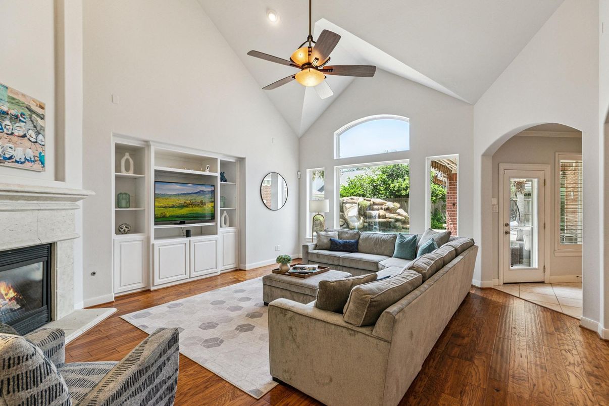 Fireplace, Interior, Living room, Recessed Lighting, Wood Texture Flooring