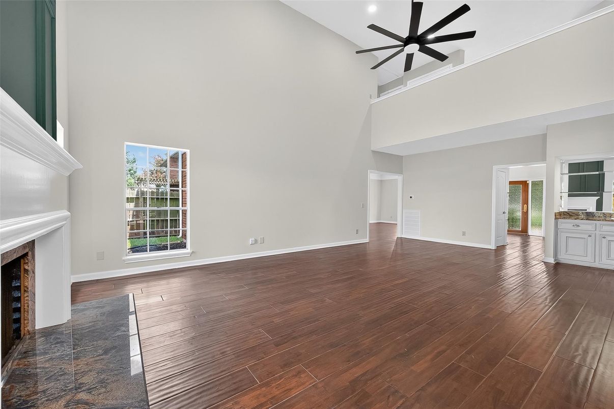 Empty room, Fireplace, Interior, Pendant Lights, Wood Texture Flooring