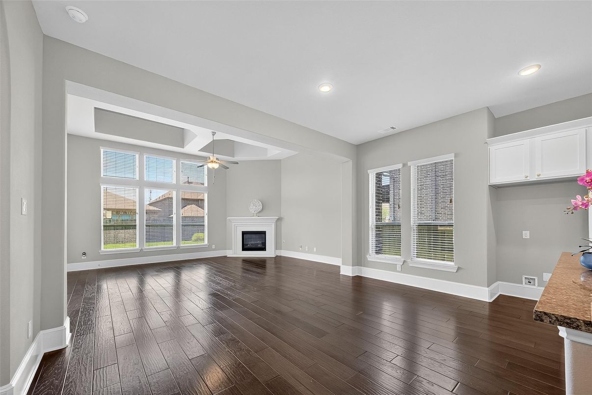 Empty room, Fireplace, Interior, Recessed Lighting, Wood Texture Flooring
