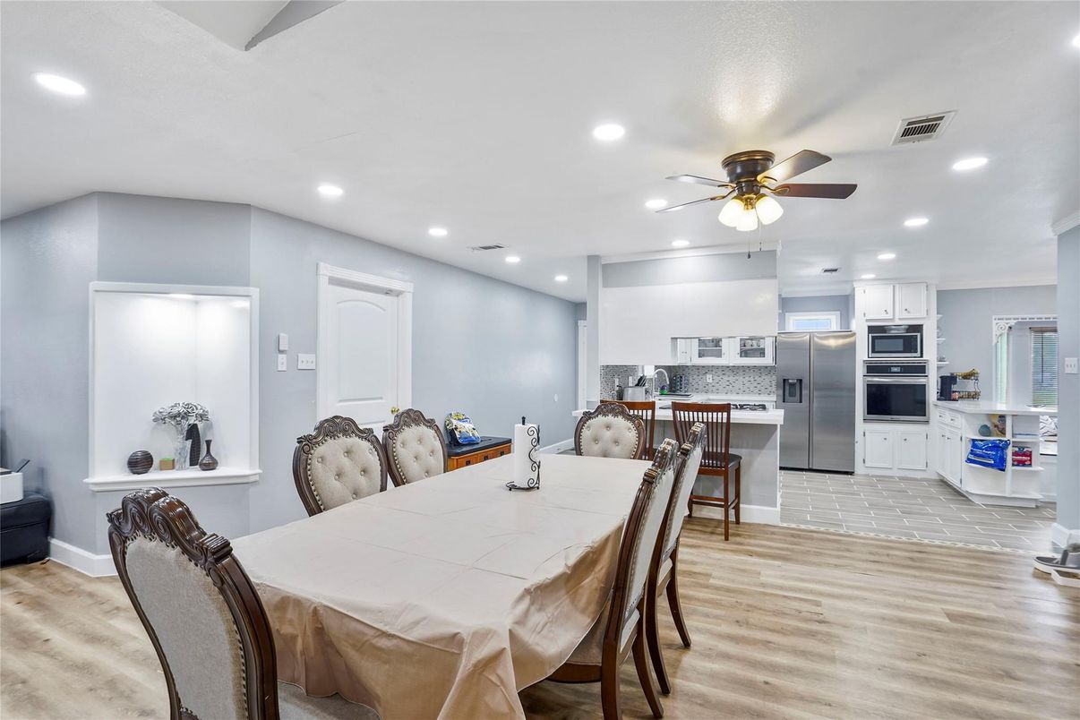 Dining room, Interior, Kitchen, Recessed Lighting, Stainless Steel Appliances, Wood Texture Flooring