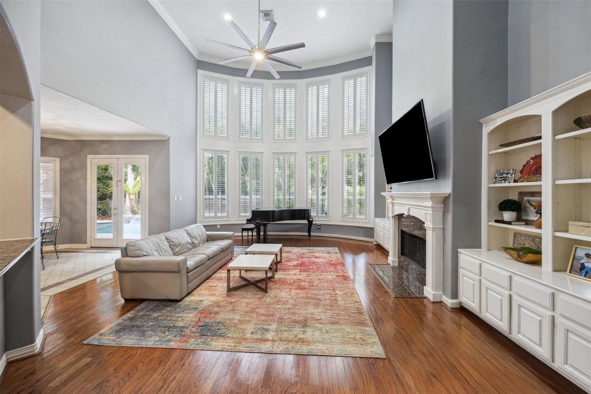 Fireplace, Interior, Living room, Piano, Recessed Lighting, Wood Texture Flooring