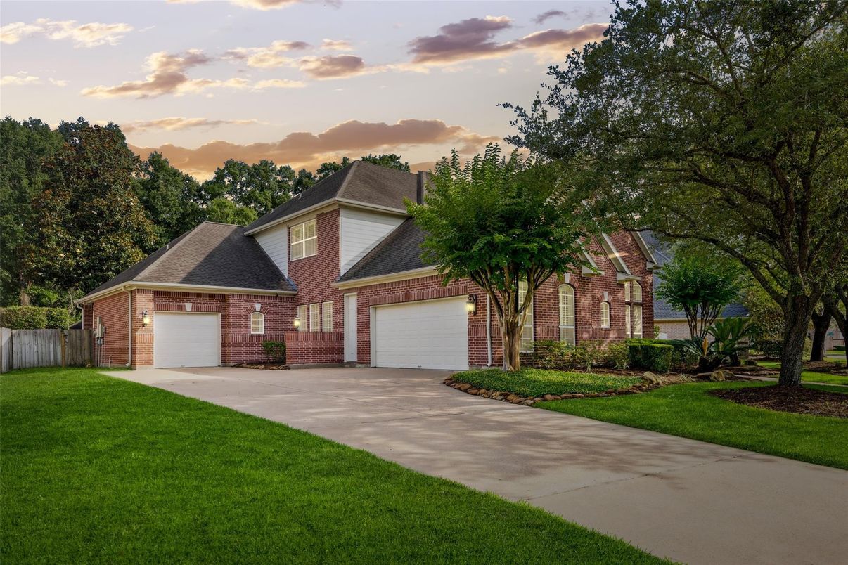 Attached, Backyard, Exterior, Facade, Brick Facade, Brick Traditional