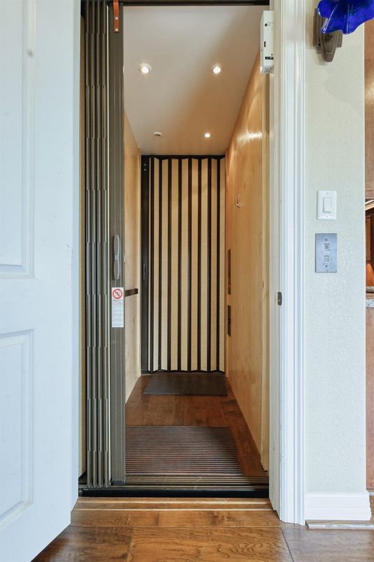 Elevator, Interior, Recessed Lighting, Wooden Walls