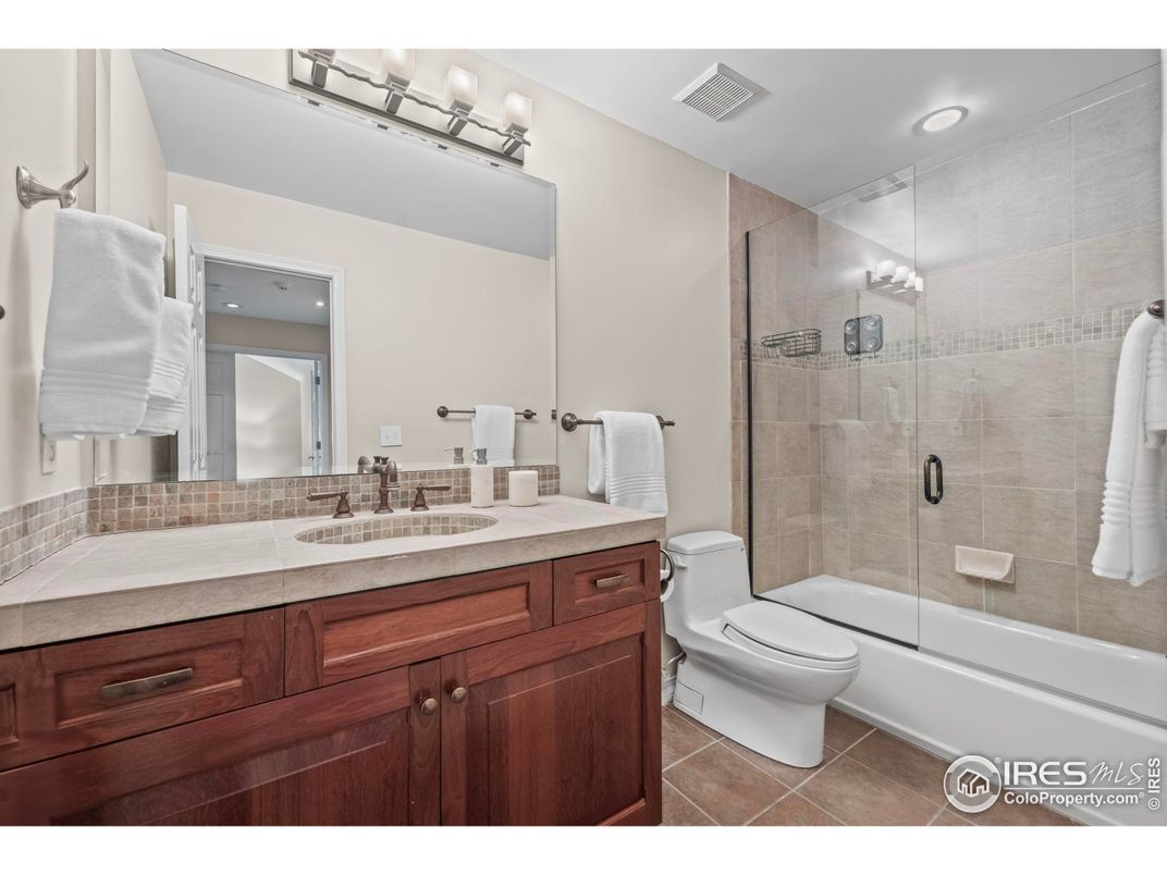 Bathroom, Glass Shower, Interior, Recessed Lighting, Tile Countertops