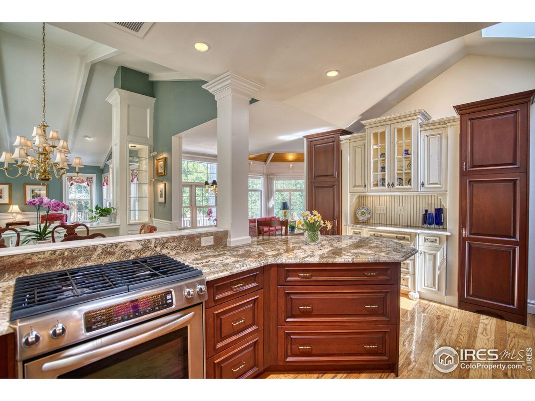 Chandelier, Interior, Kitchen, Pendant Lights, Recessed Lighting, Stainless Steel Appliances, Wood Texture Flooring