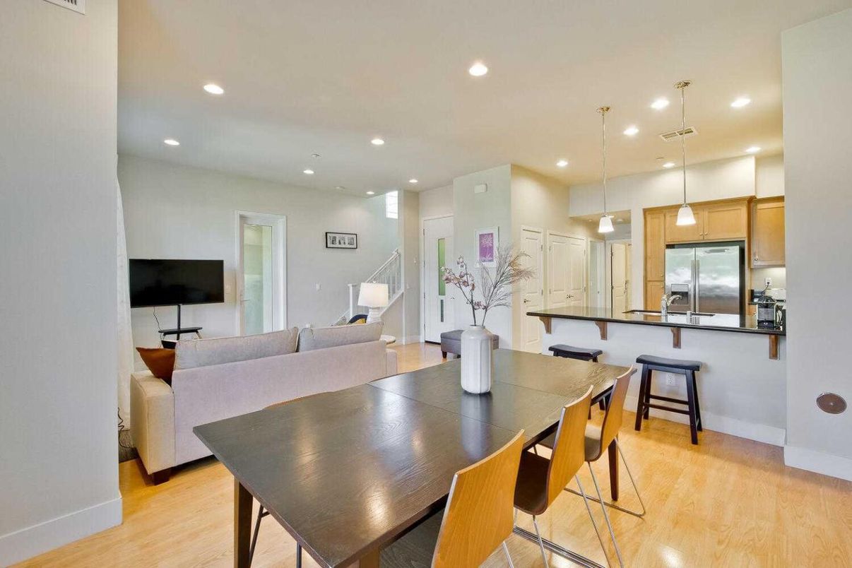 Dining room, Interior, Kitchen, Living room, Pendant Lights, Recessed Lighting, Stainless Steel Appliances, Wood Texture Flooring