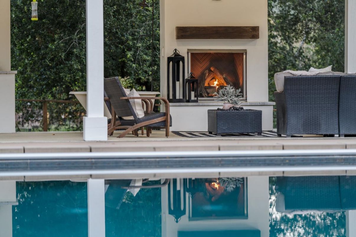 Exterior, Fireplace, Pool