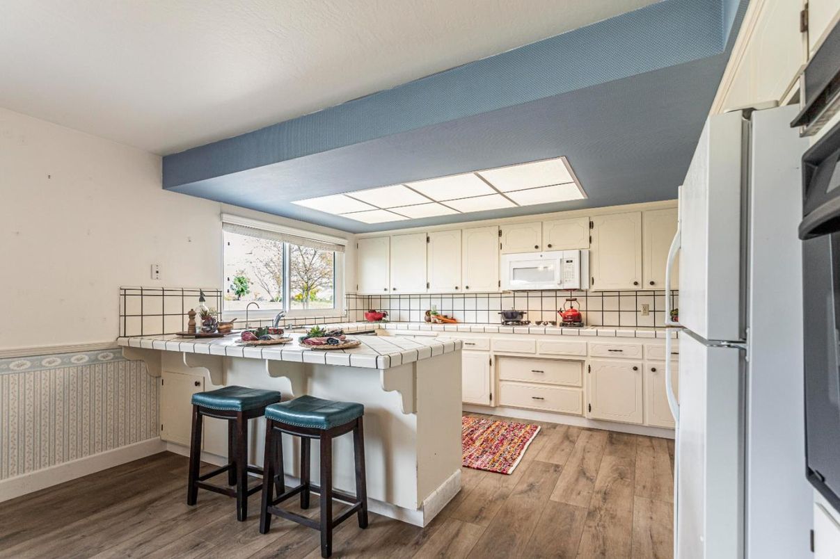 Interior, Kitchen, Tile Countertops, Wood Texture Flooring
