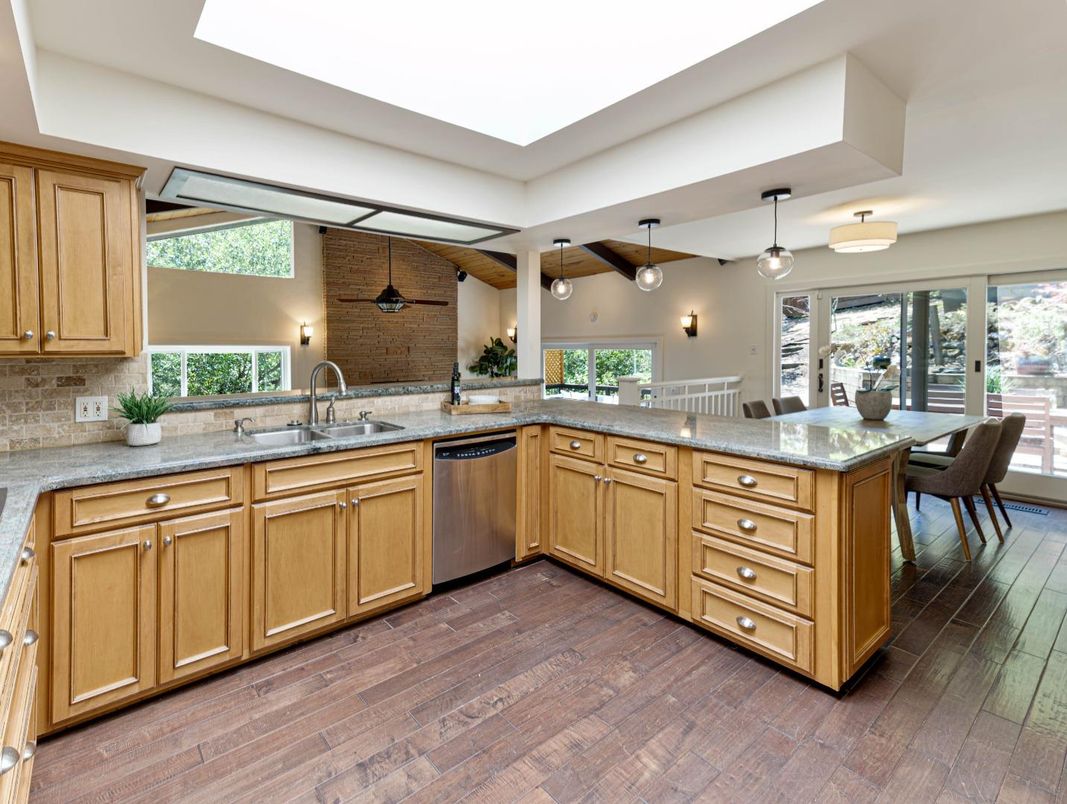 Dining room, Interior, Kitchen, Pendant Lights, Stainless Steel Appliances, Stone Walls, Wood Texture Flooring