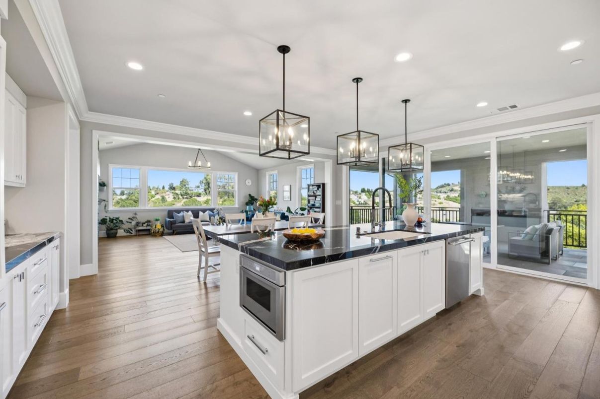 Dining room, Interior, Kitchen, Pendant Lights, Recessed Lighting, Stainless Steel Appliances, Wood Texture Flooring