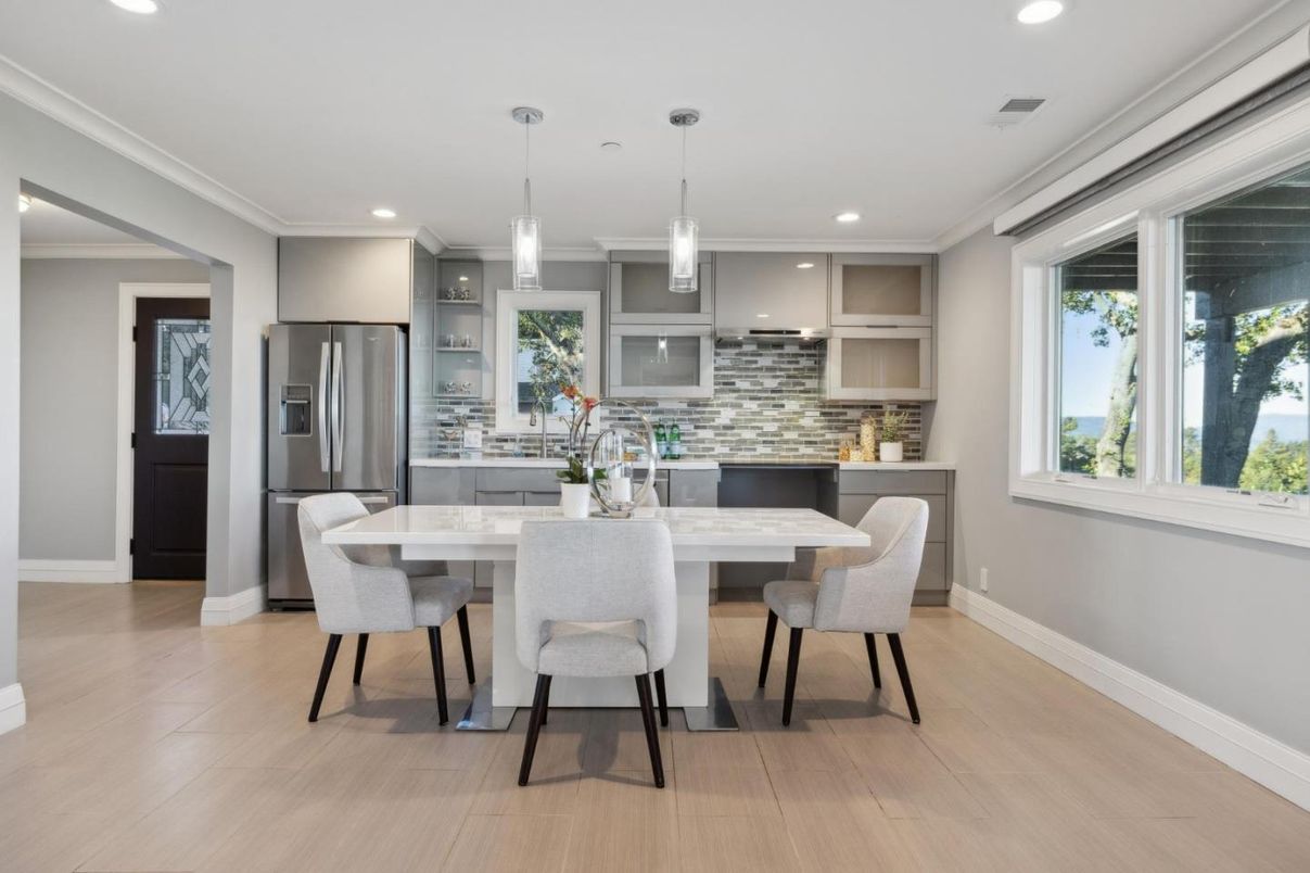 Dining room, Interior, Kitchen, Pendant Lights, Recessed Lighting, Stainless Steel Appliances, Wood Texture Flooring