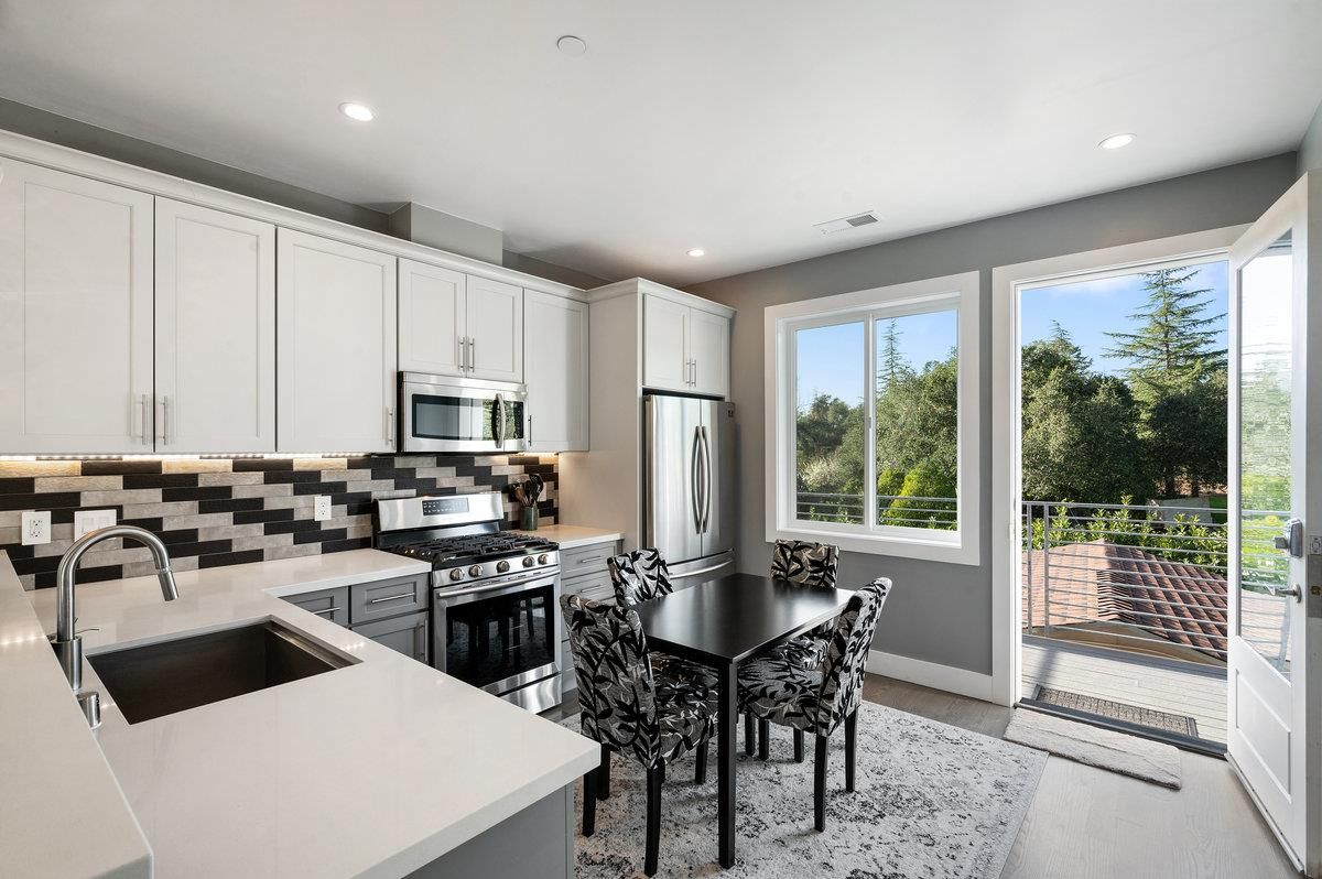 Dining room, Interior, Kitchen, Recessed Lighting, Stainless Steel Appliances, Wood Texture Flooring