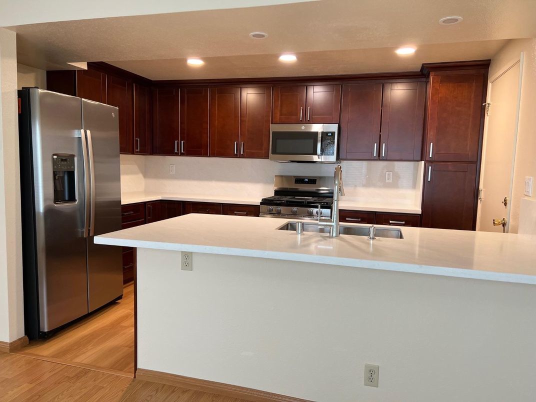 Interior, Kitchen, Recessed Lighting, Stainless Steel Appliances, Wood Texture Flooring