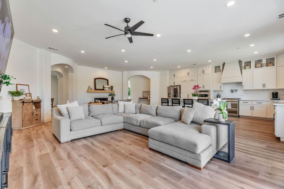 Dining room, Fireplace, Interior, Kitchen, Living room, Recessed Lighting, Stainless Steel Appliances, Wood Texture Flooring