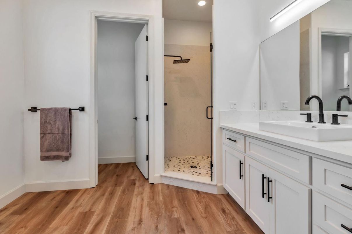 Bathroom, Dual Sink Vanities, Interior, Recessed Lighting, Wood Texture Flooring