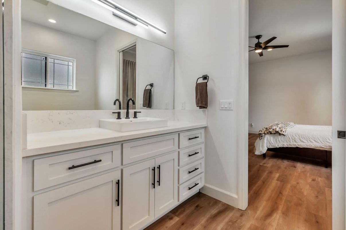 Bathroom, Bedroom, Dual Sink Vanities, Interior, Recessed Lighting, Wood Texture Flooring