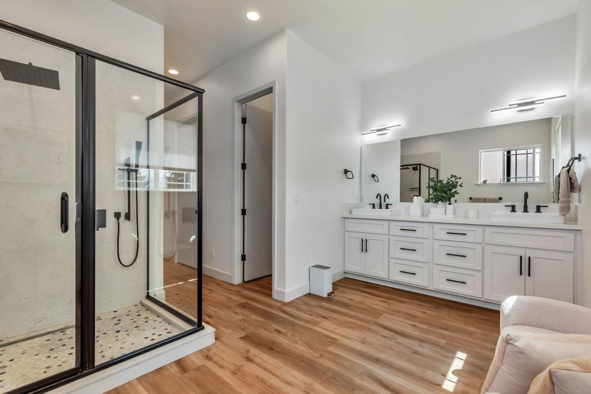 Bathroom, Dual Sink Vanities, Glass Shower, Interior, Recessed Lighting, Wood Texture Flooring