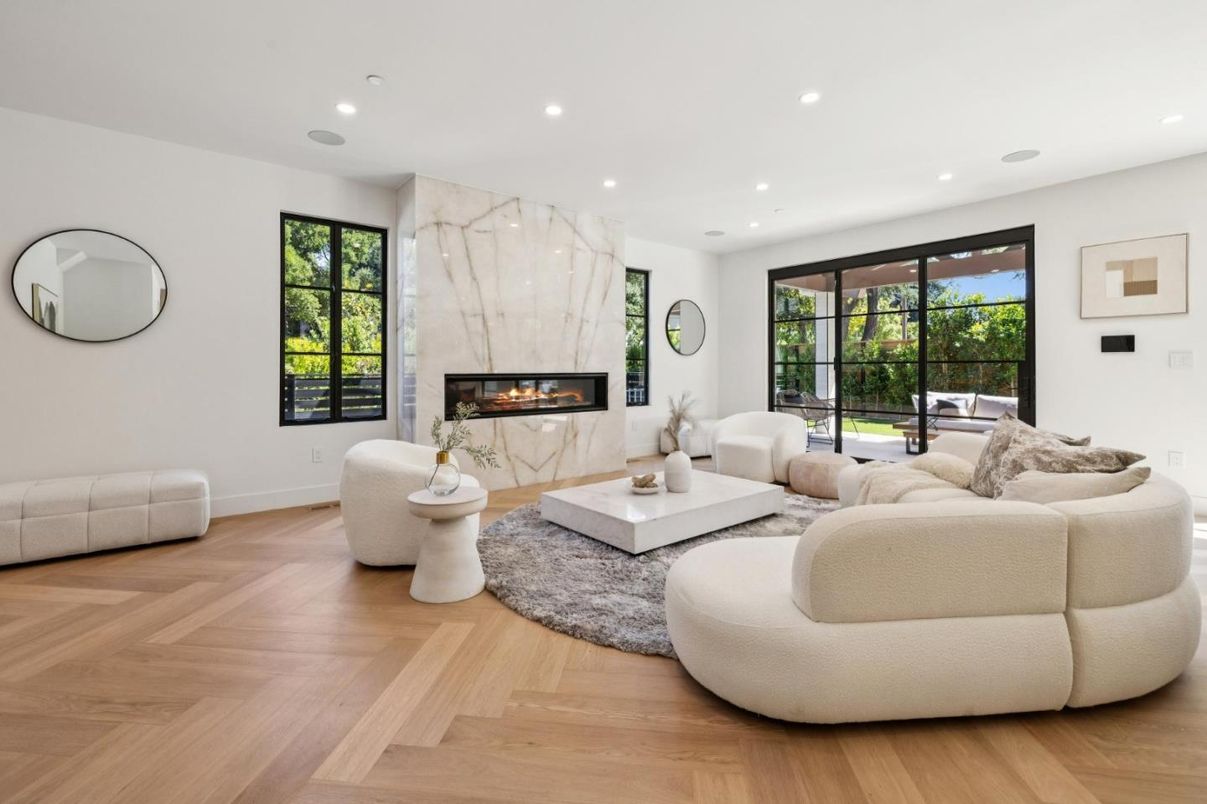 Fireplace, Interior, Living room, Marble Walls, Recessed Lighting, Wood Texture Flooring