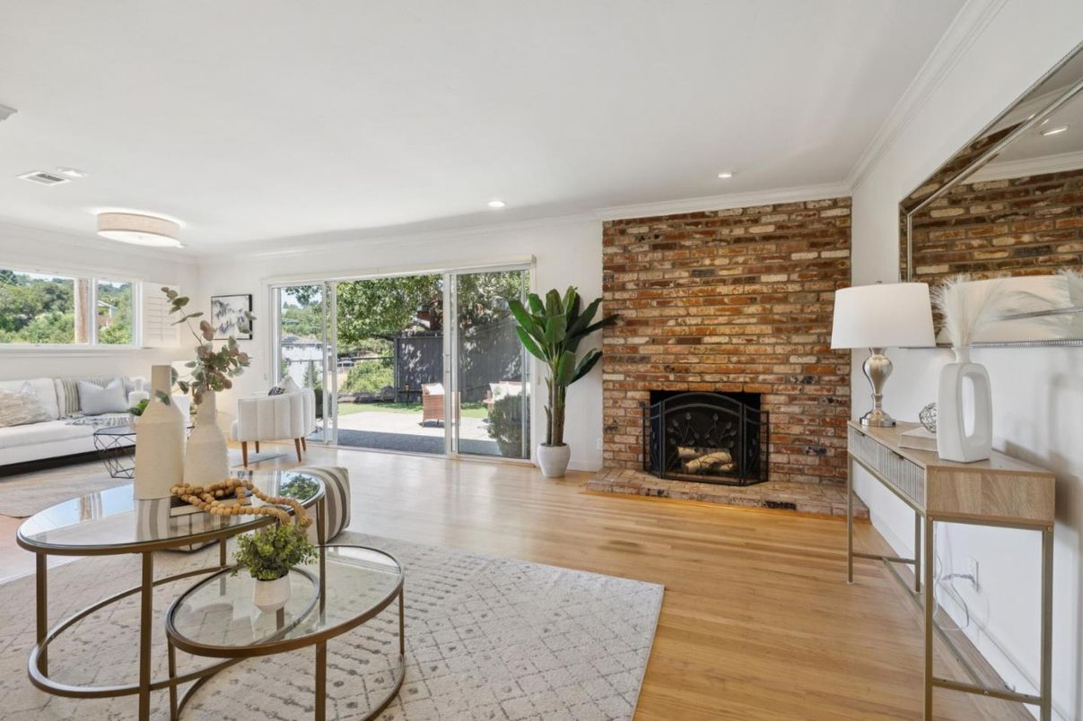 Fireplace, Interior, Living room, Recessed Lighting, Stone Walls, Wood Texture Flooring