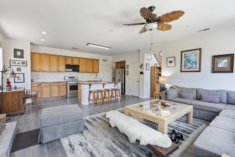 Dining room, Interior, Kitchen, Living room, Recessed Lighting, Stainless Steel Appliances, Wood Texture Flooring