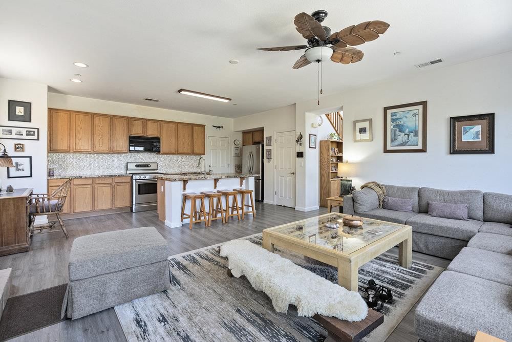 Dining room, Interior, Kitchen, Living room, Recessed Lighting, Stainless Steel Appliances, Wood Texture Flooring